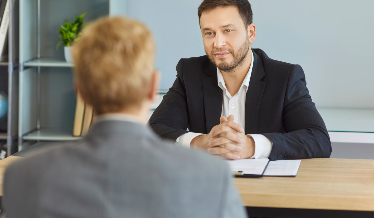 A man involved in a legal discussion with a lawyer wonders if depositions are public record