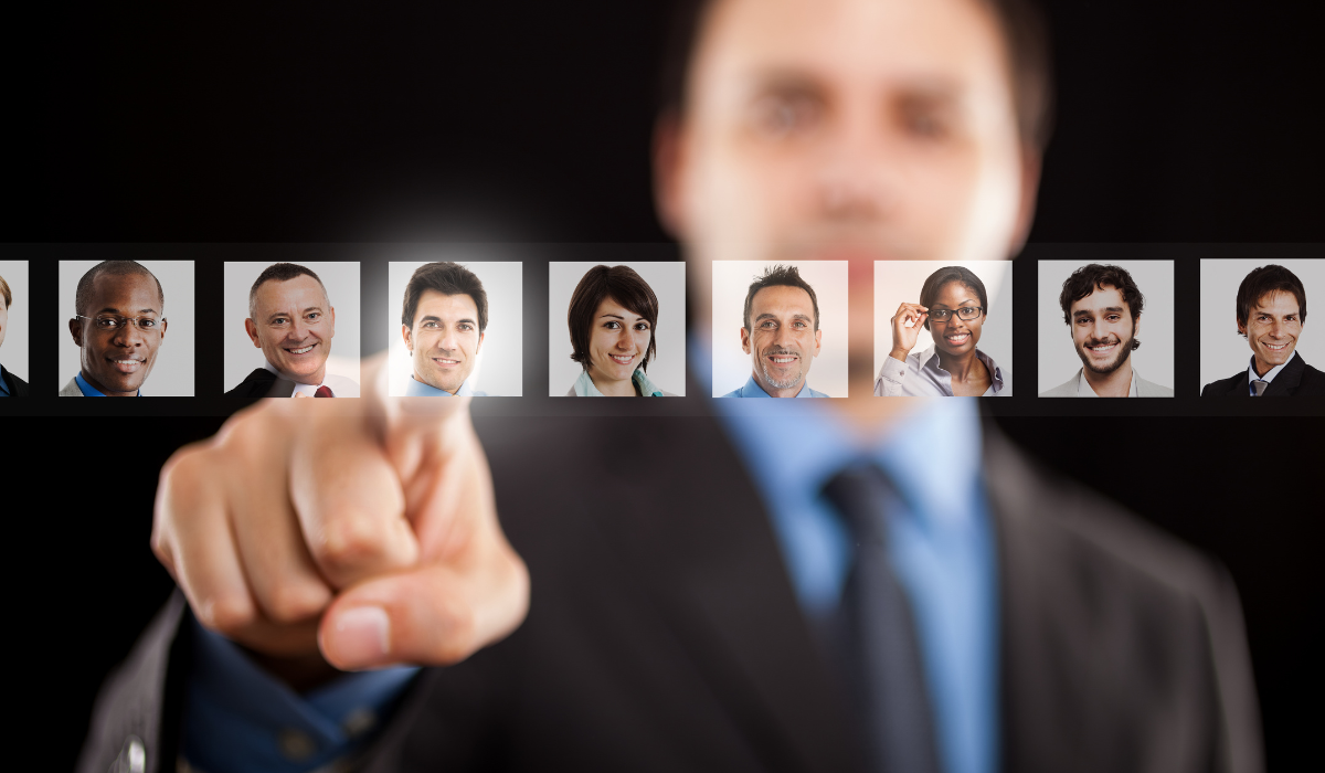 A man, choosing the right certified legal interpreter from a lineup of diverse professionals—highlighting key questions to ask your language-service provider.